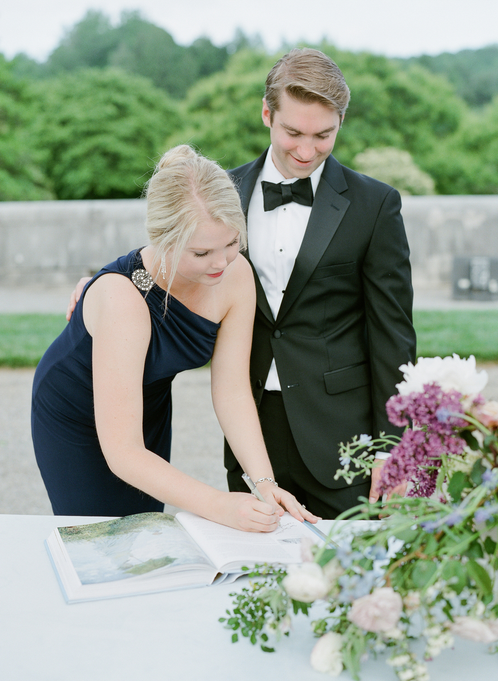 wedding guests sign guest book at Biltmore Estate wedding