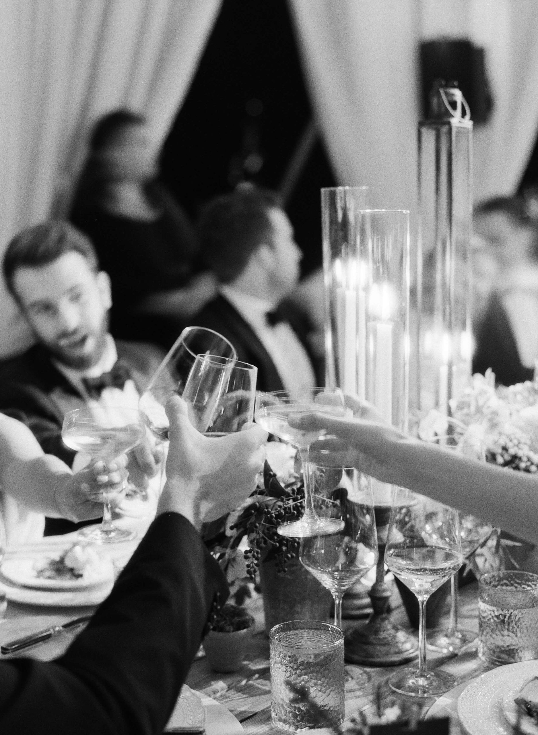 guests raise their glasses to toast