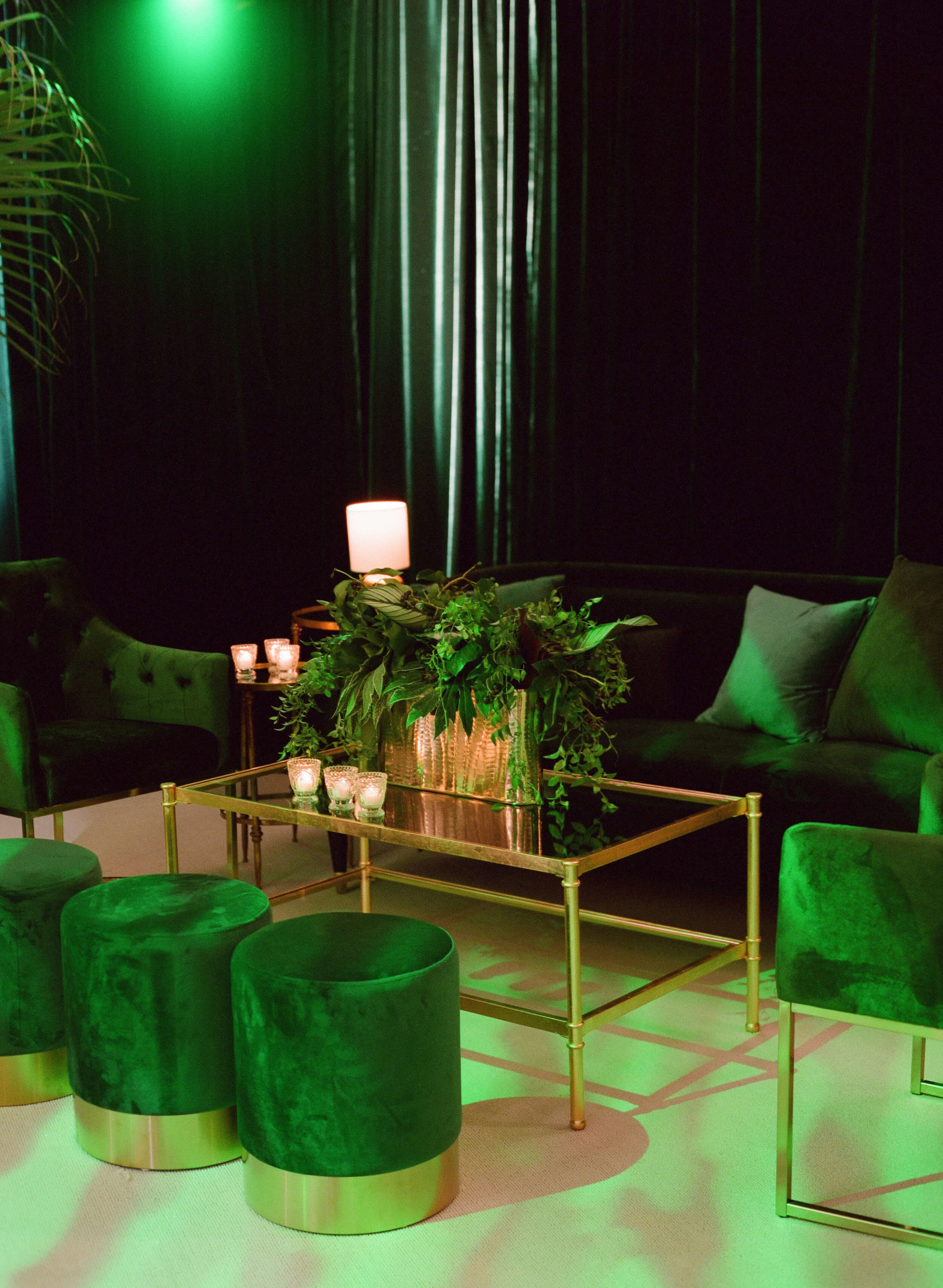 green velvet lounge chair in dance tent