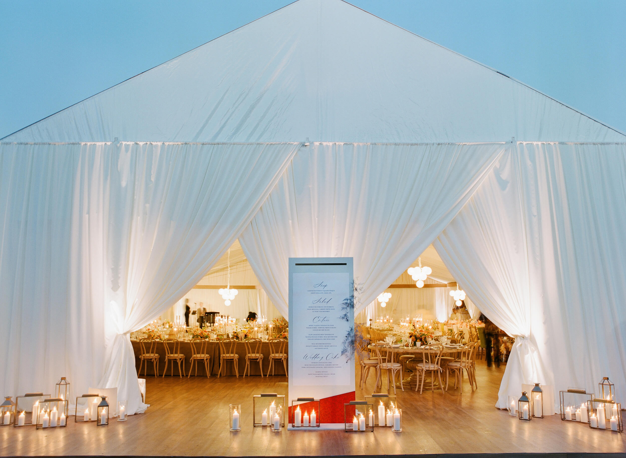 reception tent with candle lanterns decor