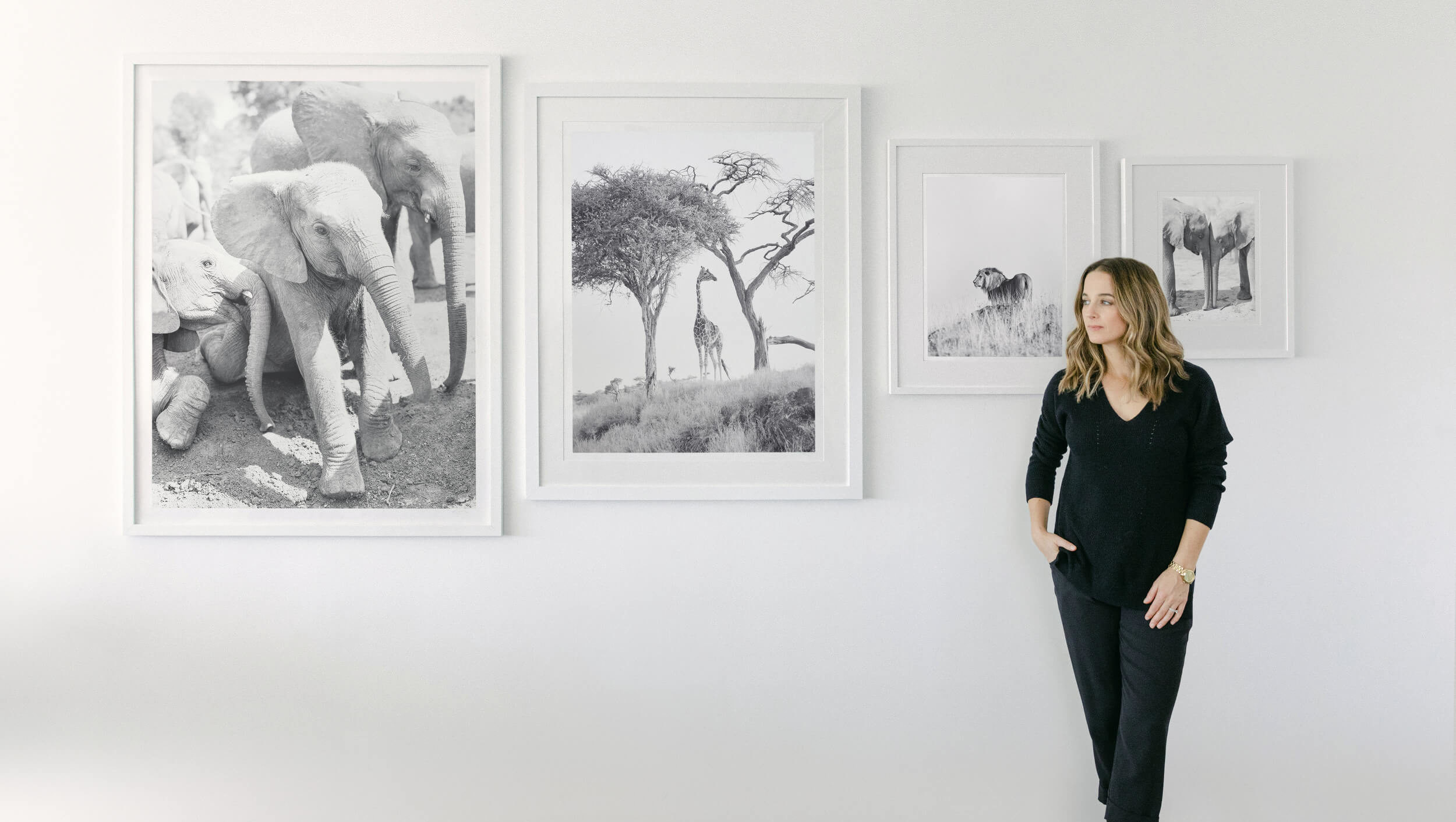 KT Merry poses with fine art photographic wildlife art prints