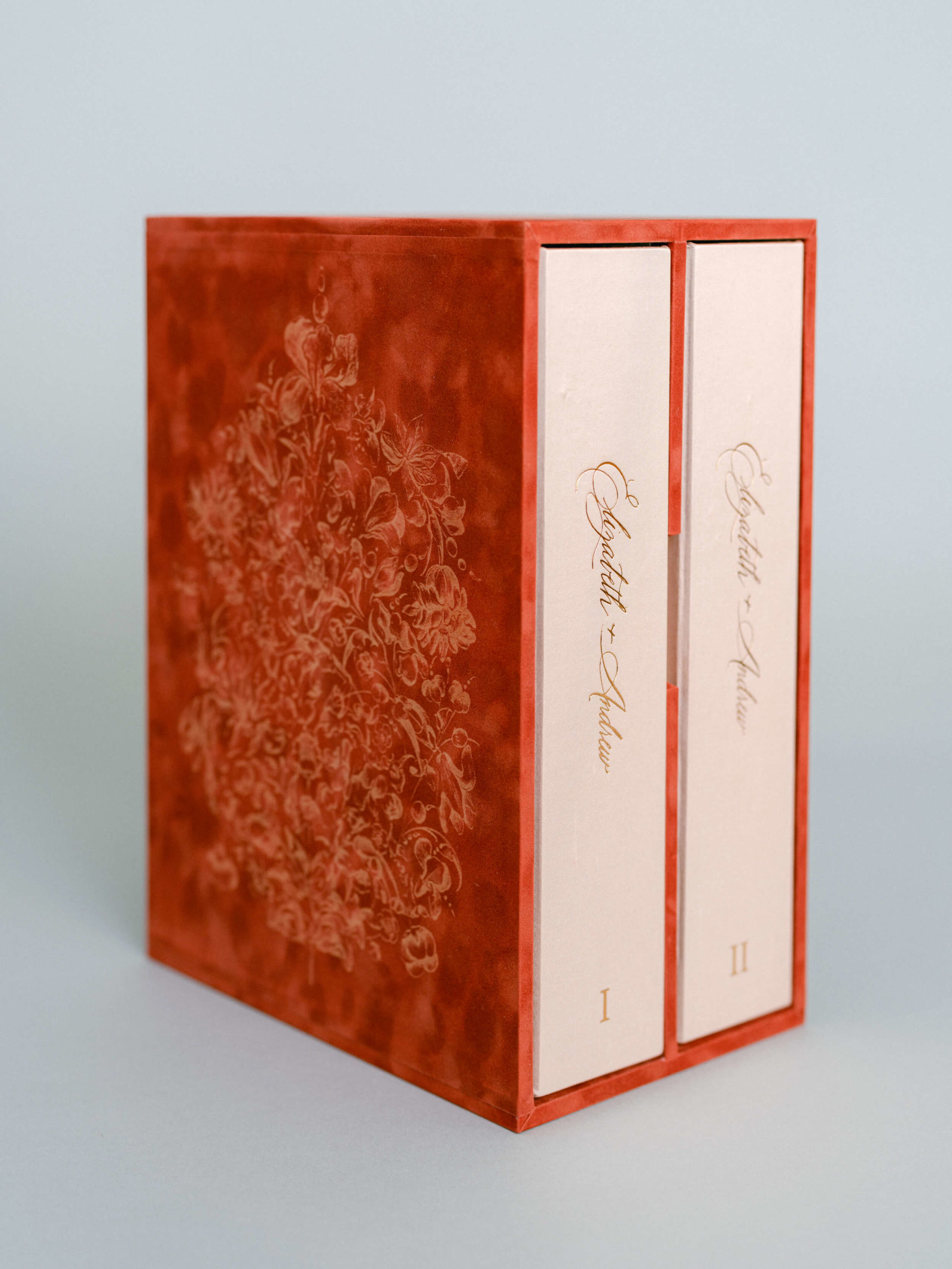 laser etching on red book cloth slipcase