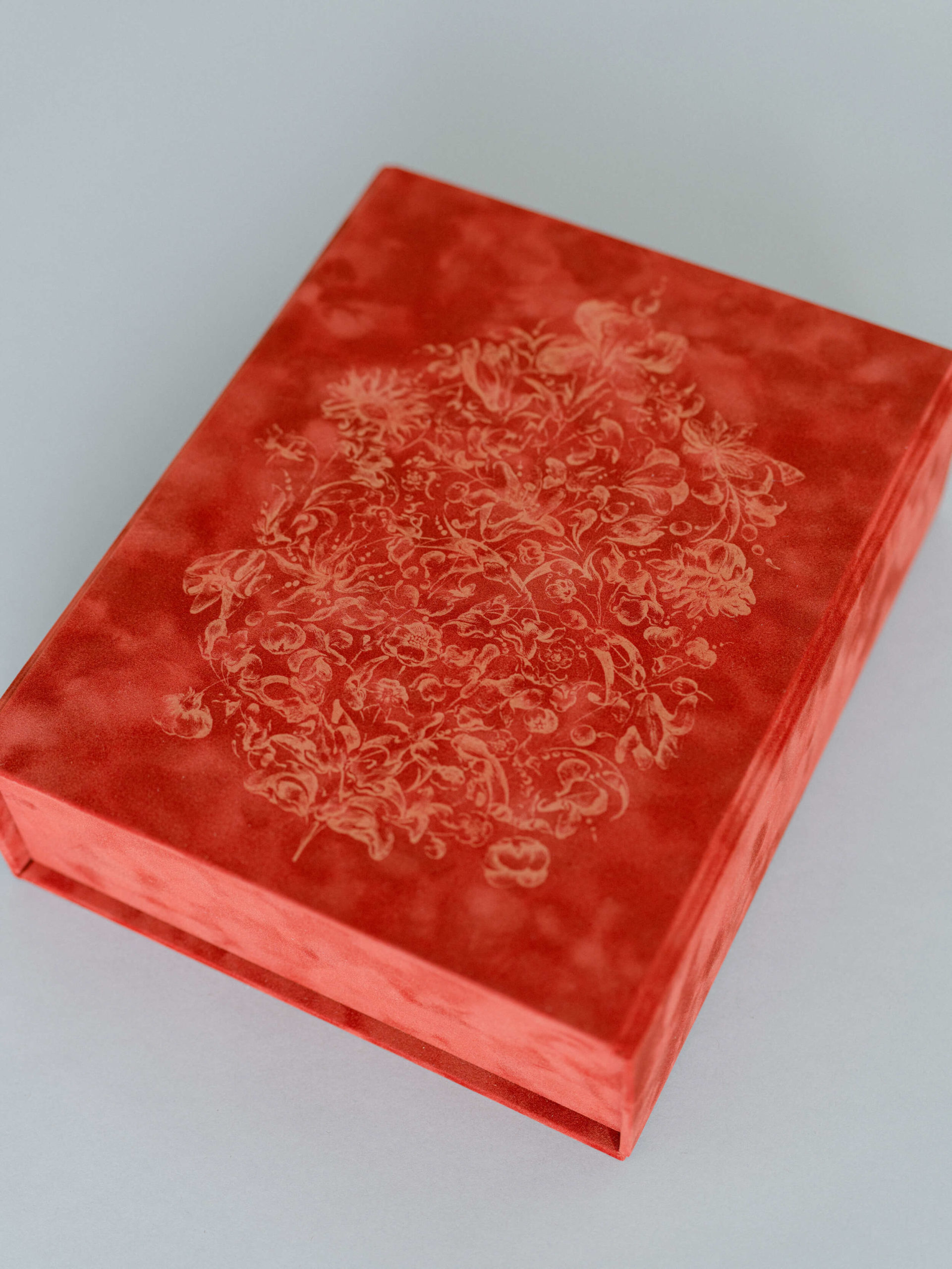 custom laser etching on red book cloth album cover