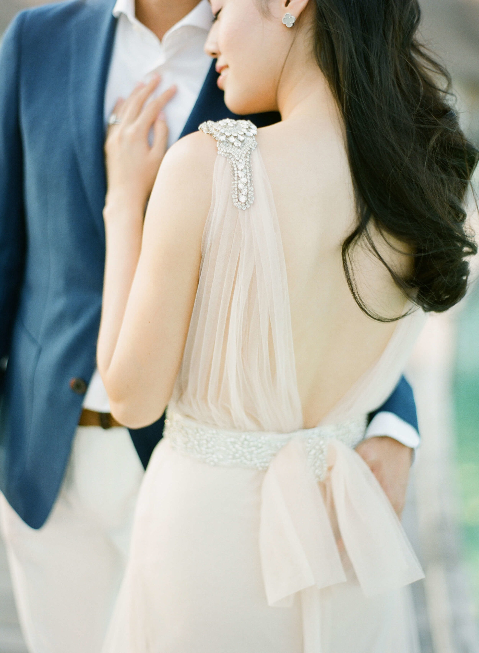 pale blush gown with crystal embellished shoulder detail