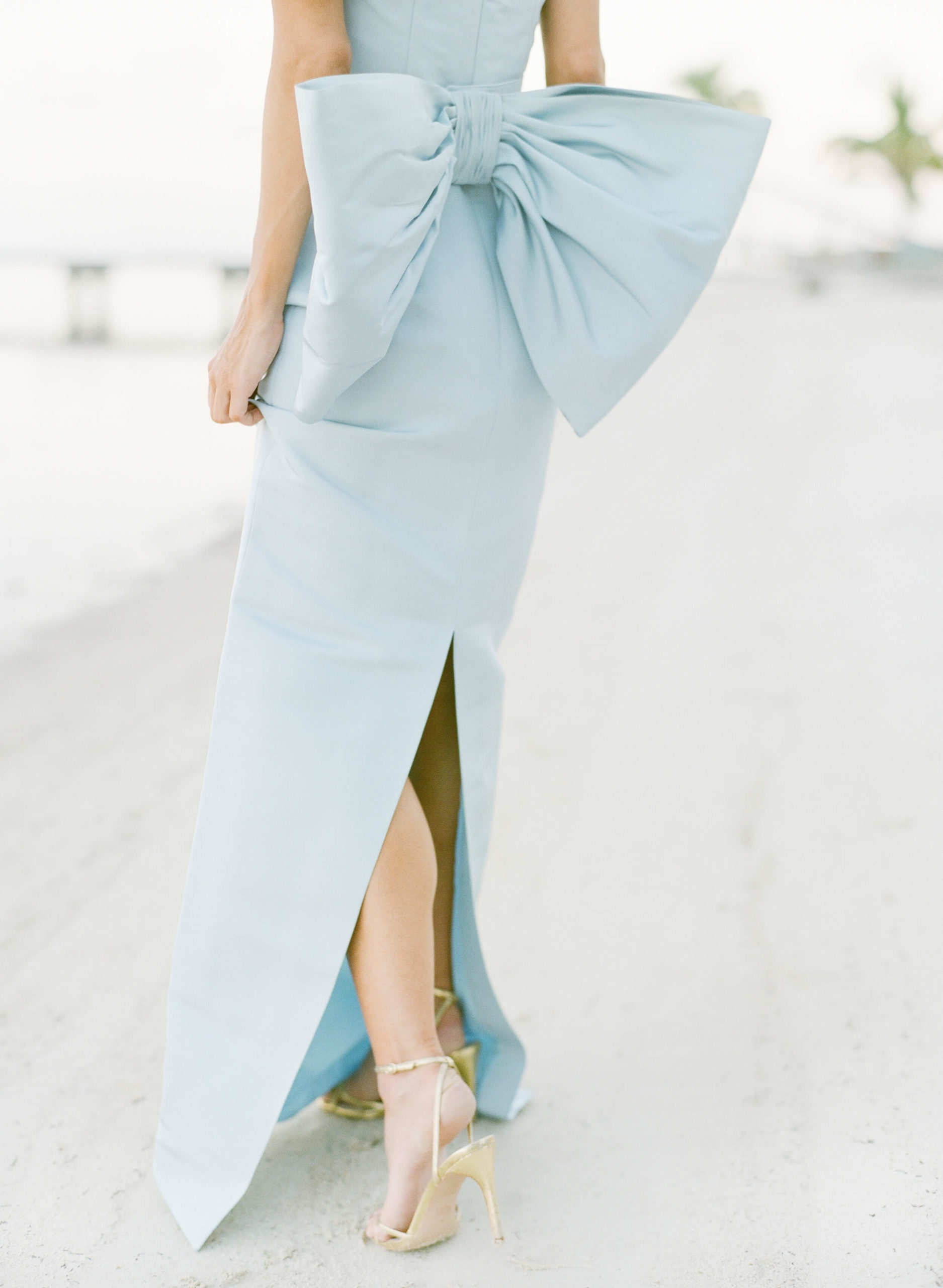 pale blue silk gown with large bow