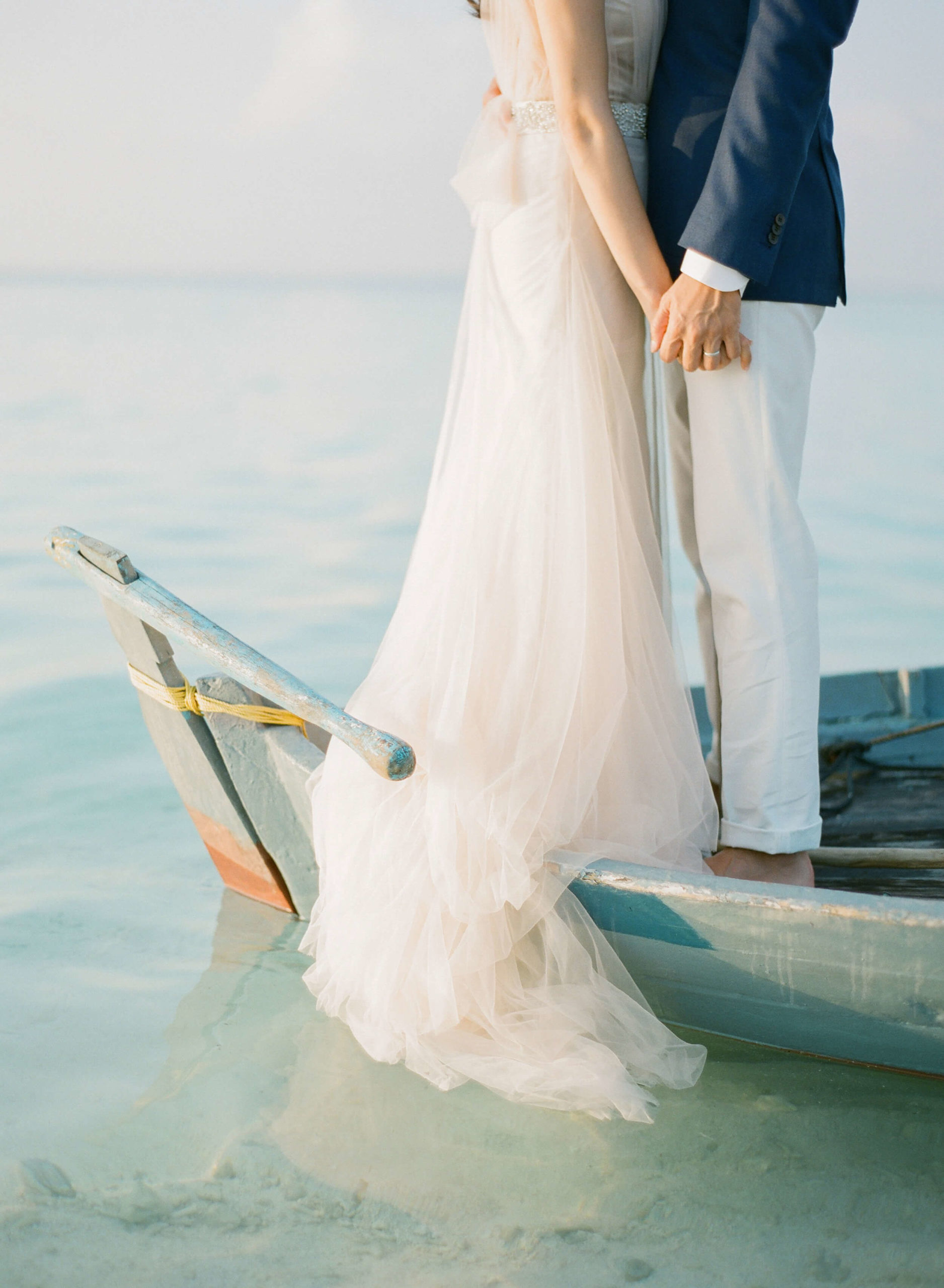 soft blush gown on bride in Maldives wedding