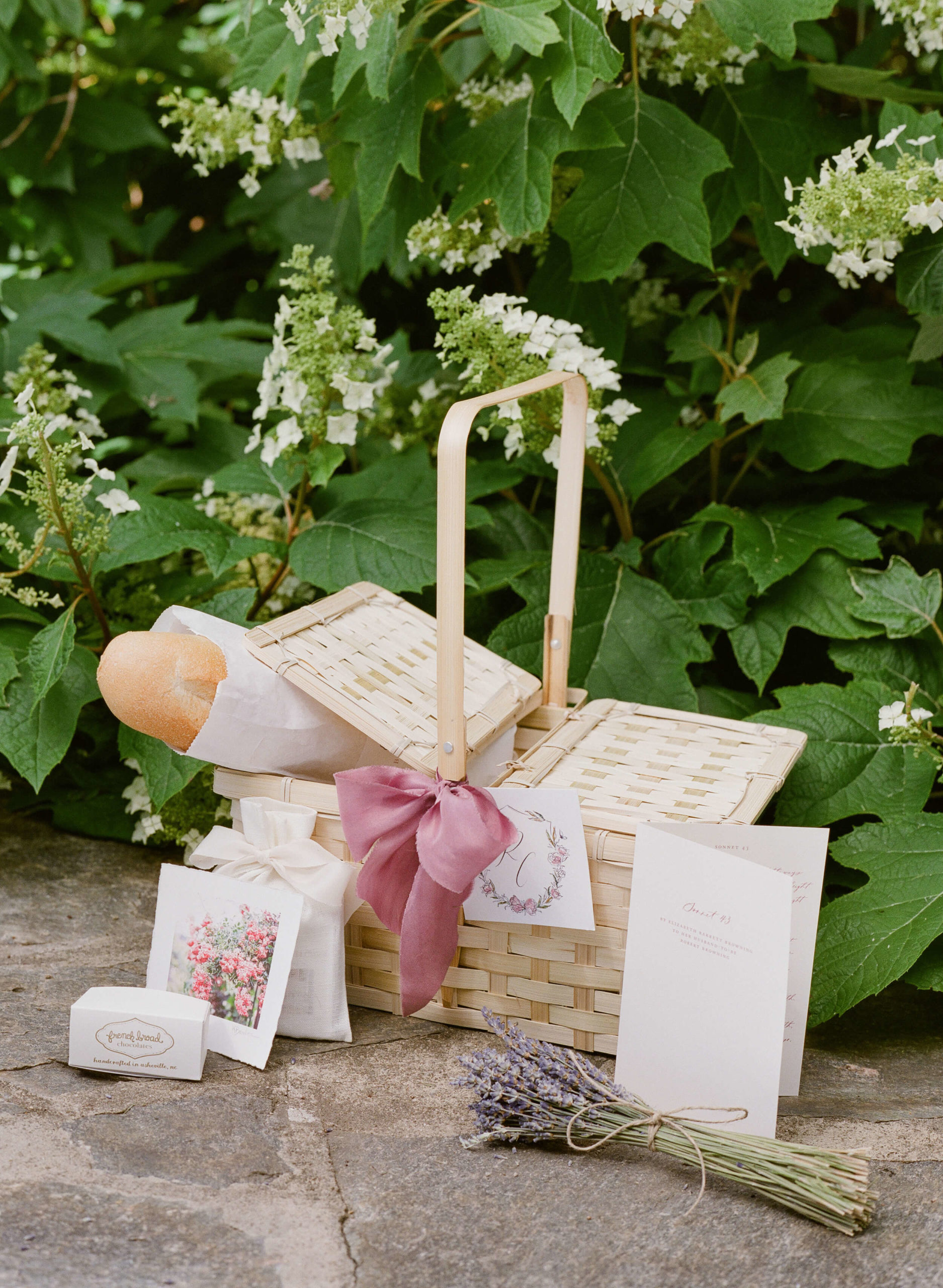 wedding welcome basket with baguette and lavender