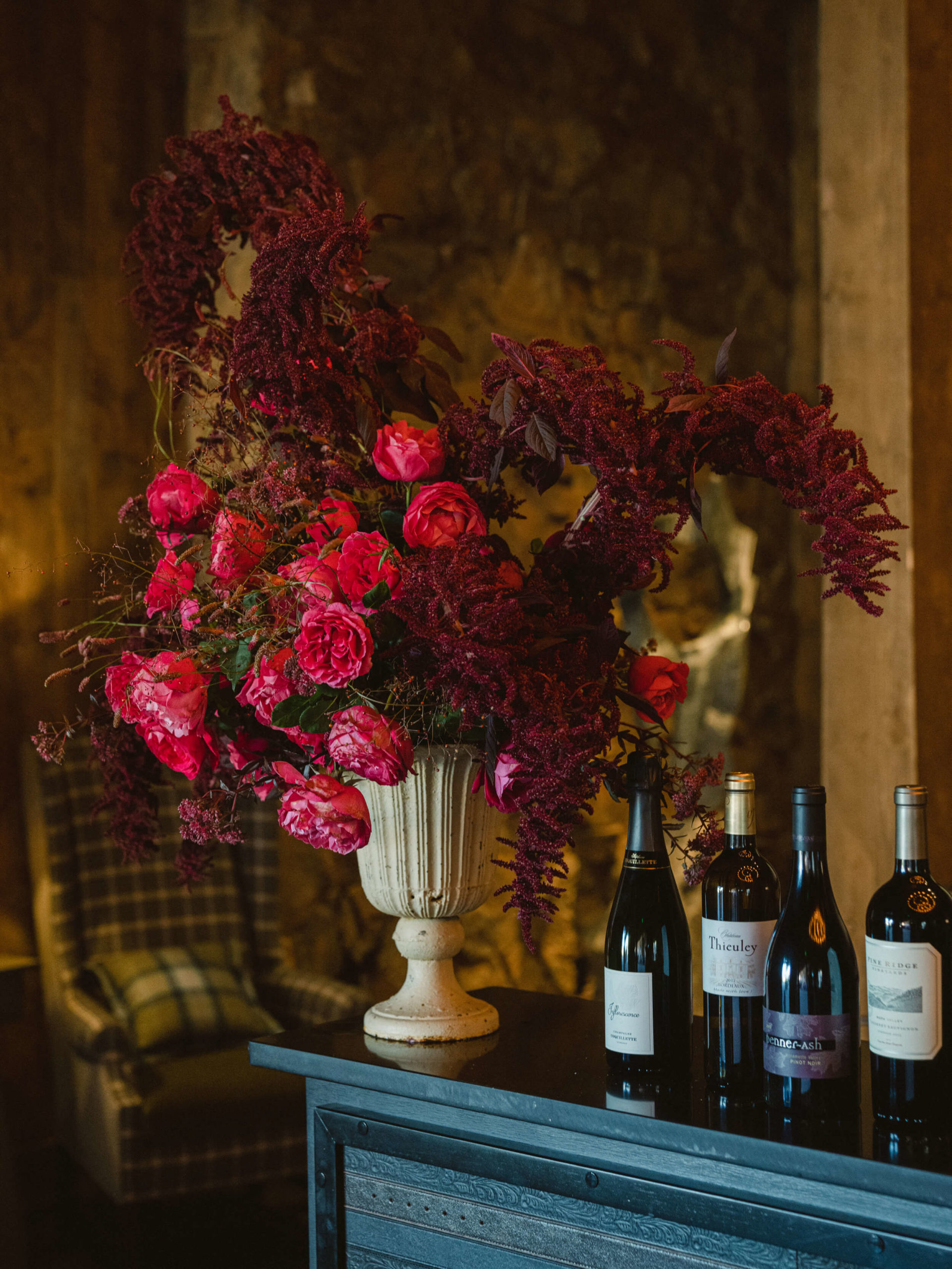 Flowers in a vase and wine