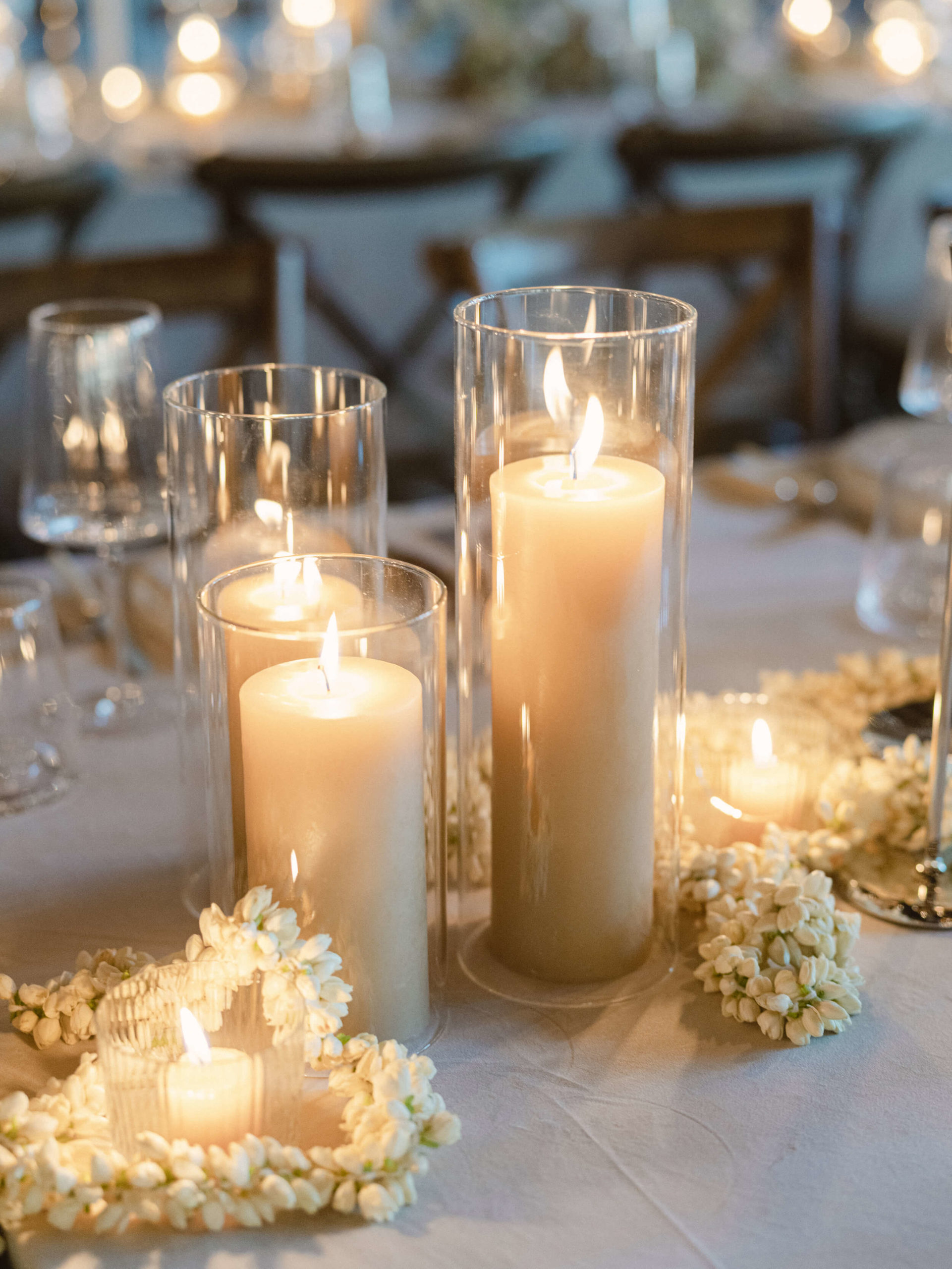 Candles and white flower garlands