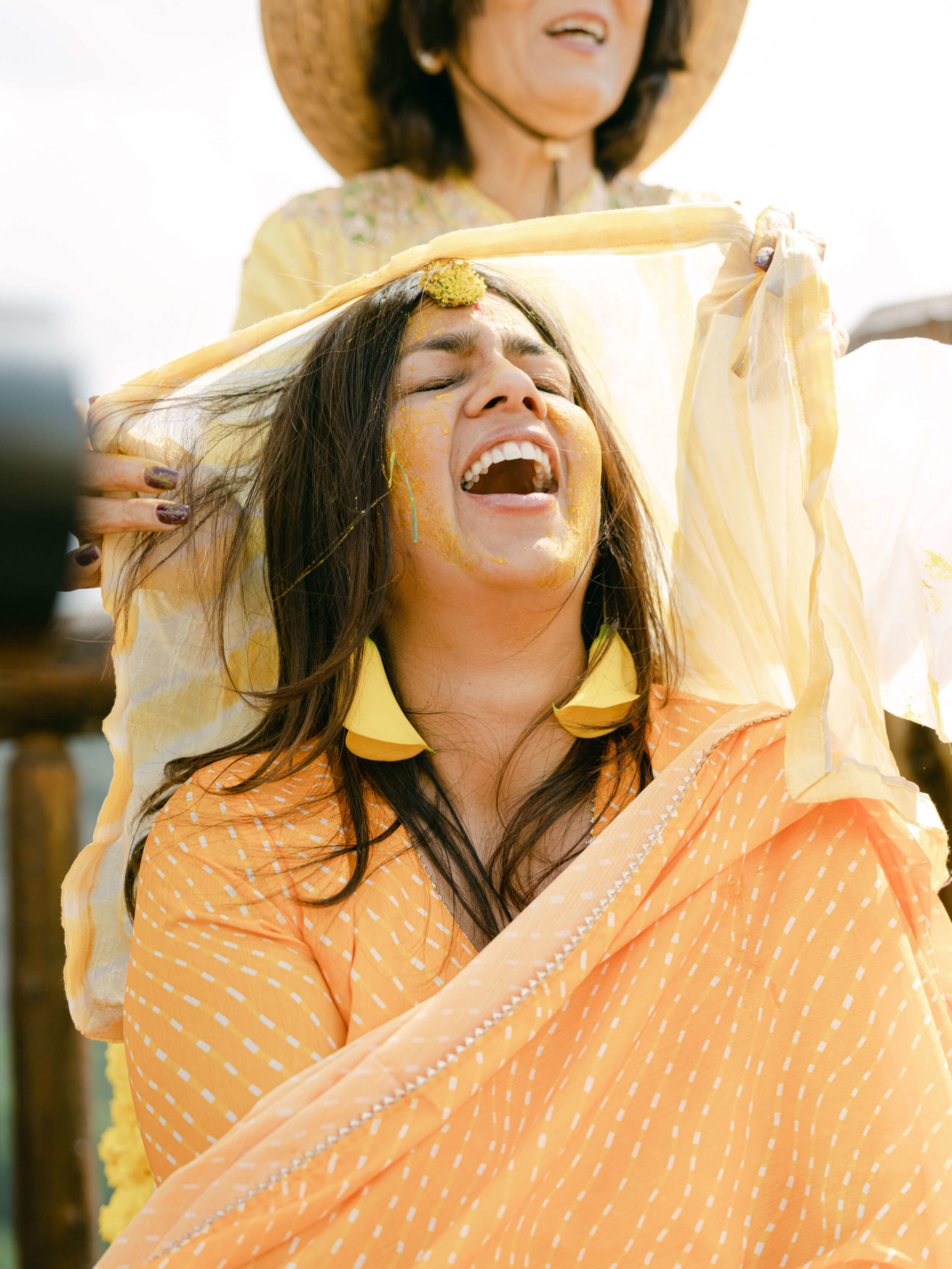 Sapna covered in turmeric paste at Haldi ceremony: an Indian wedding tradition