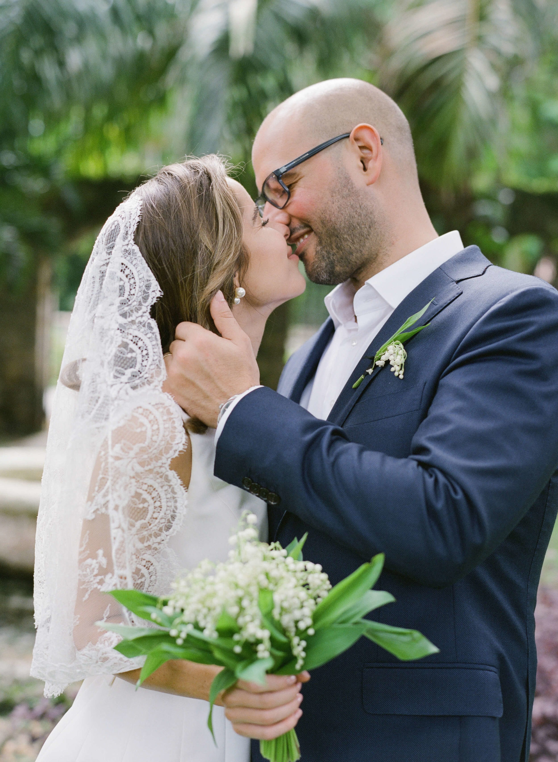 Stephanie and Pedro kissing at their Miami wedding
