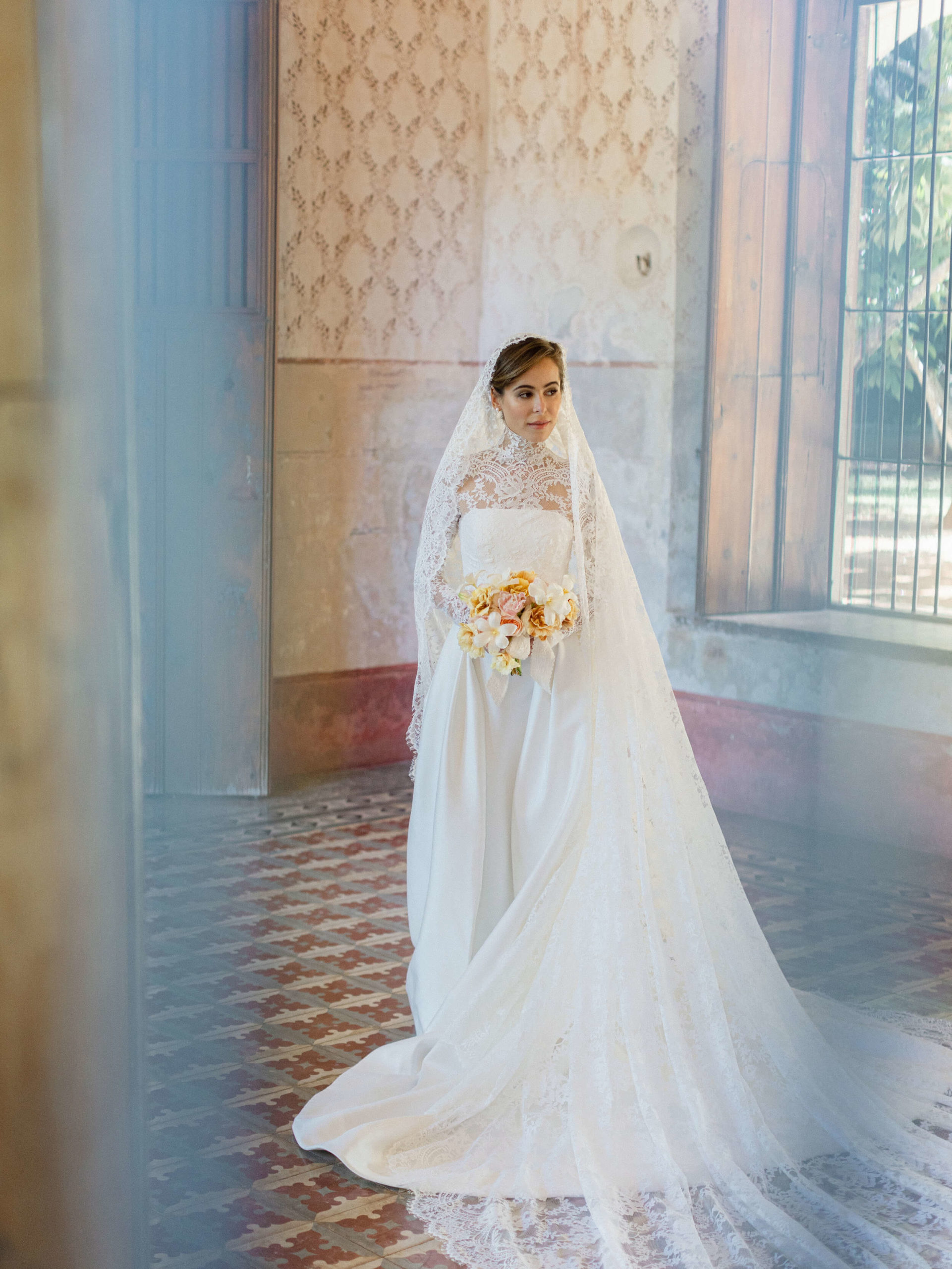 Bride posing in wedding dress