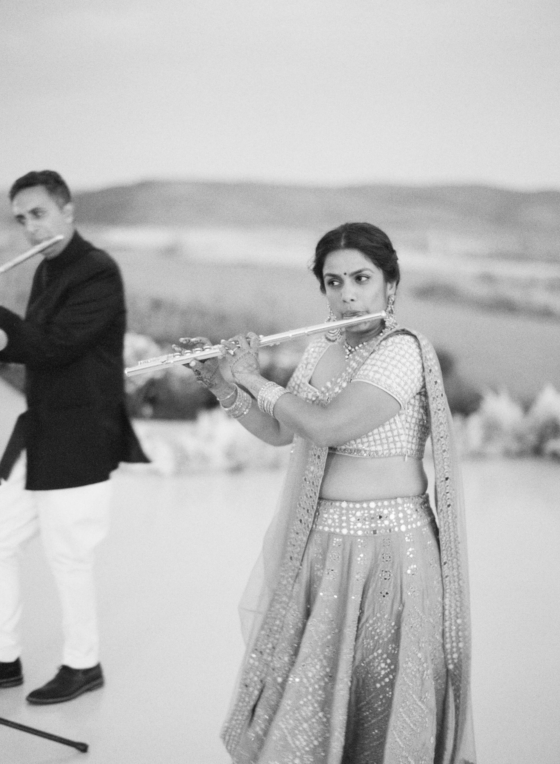 Sapna and her brother performing a flute duet