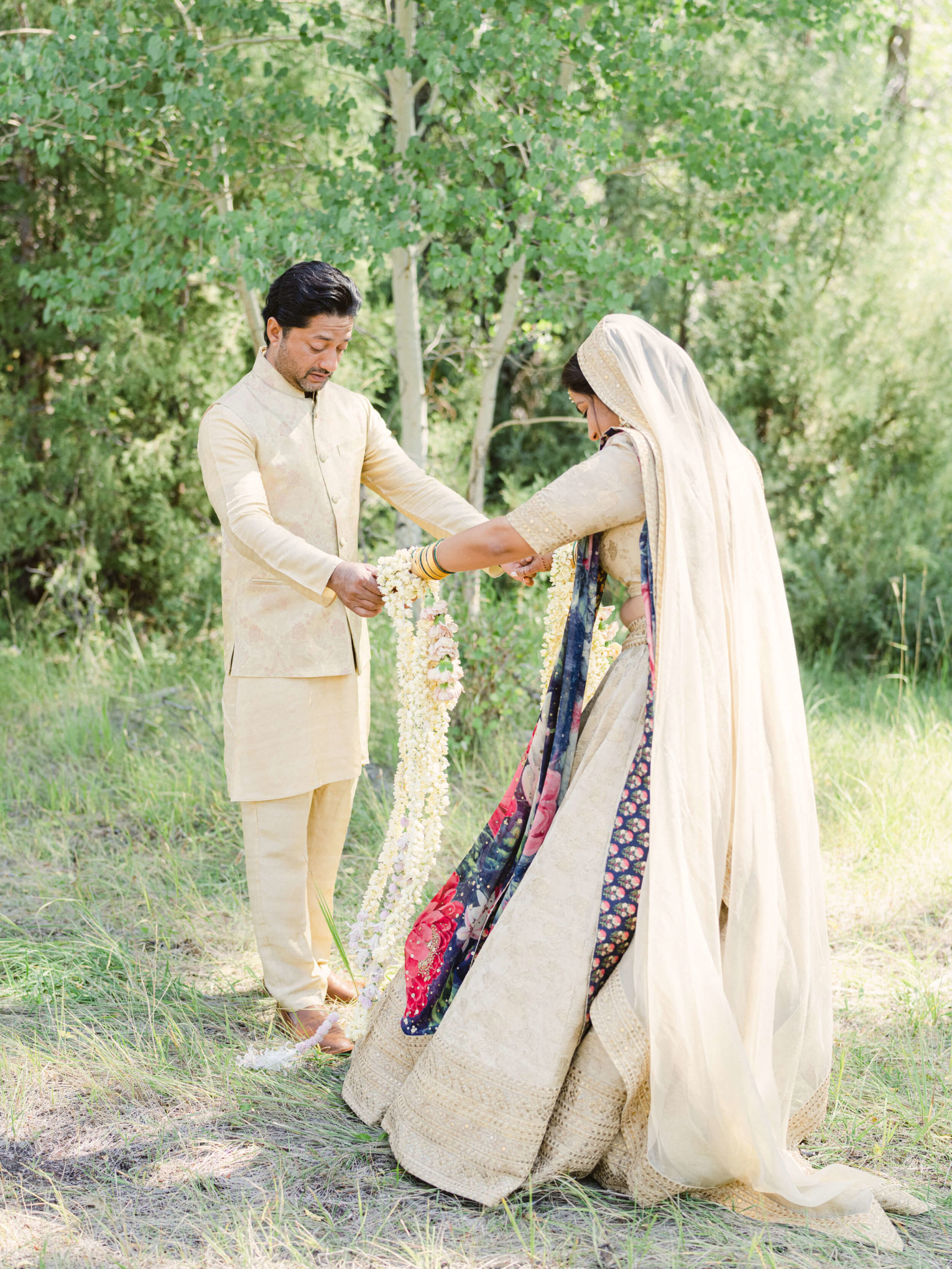 Ari admiring Sapna in her Indian wedding dress