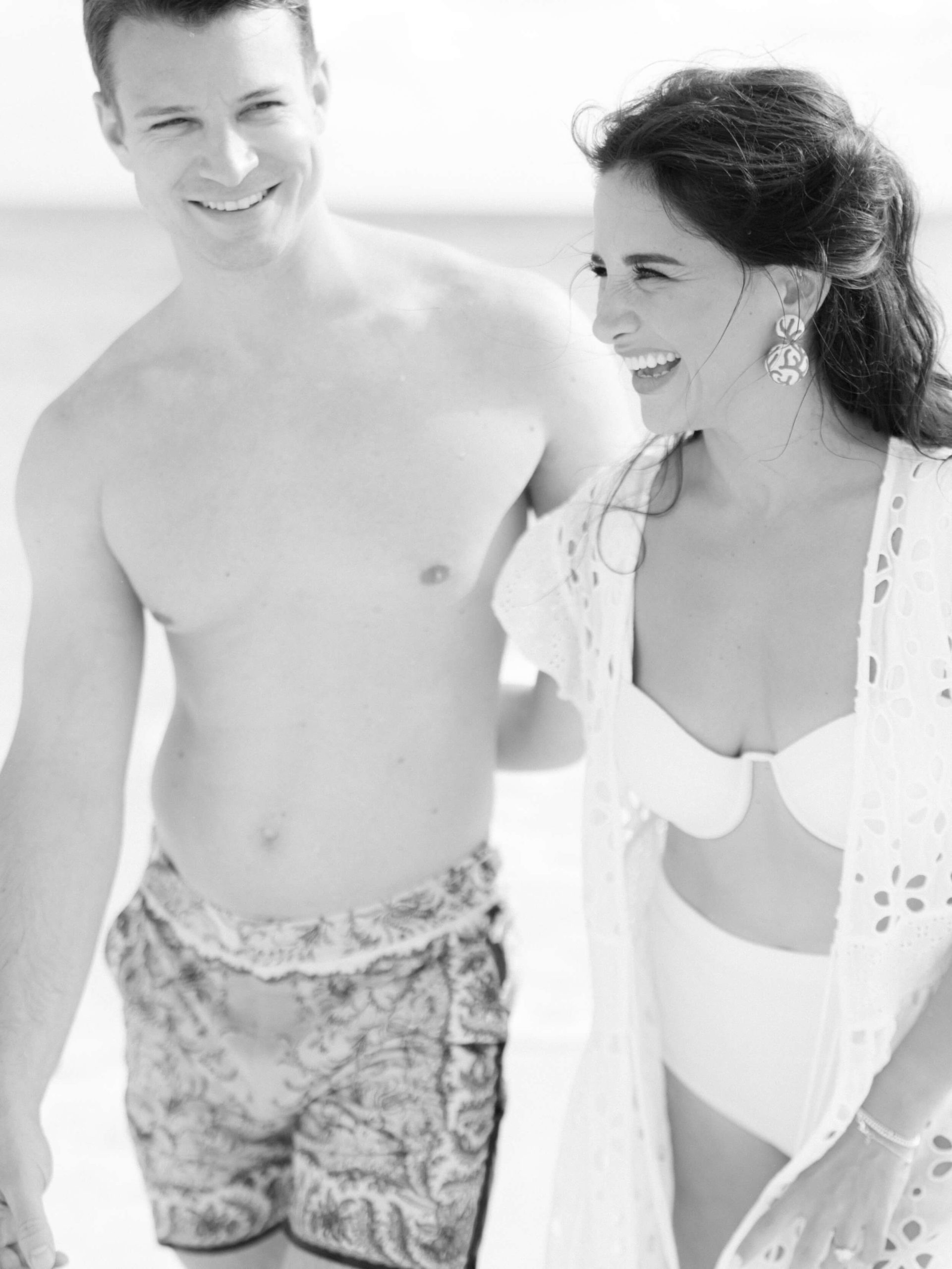 Liz and Dave laughing in their beachwear