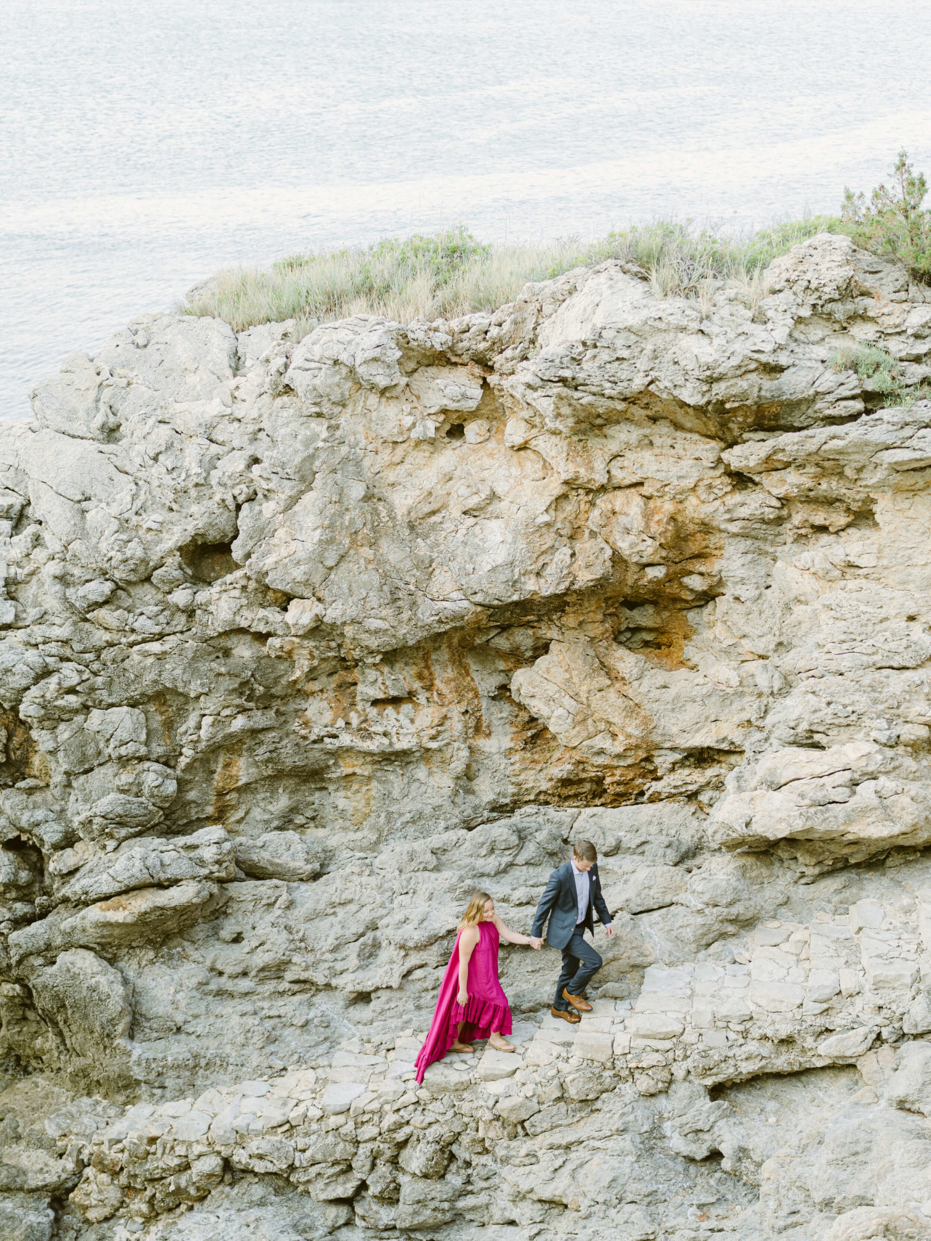 Bride and groom on rocks in Croatia
