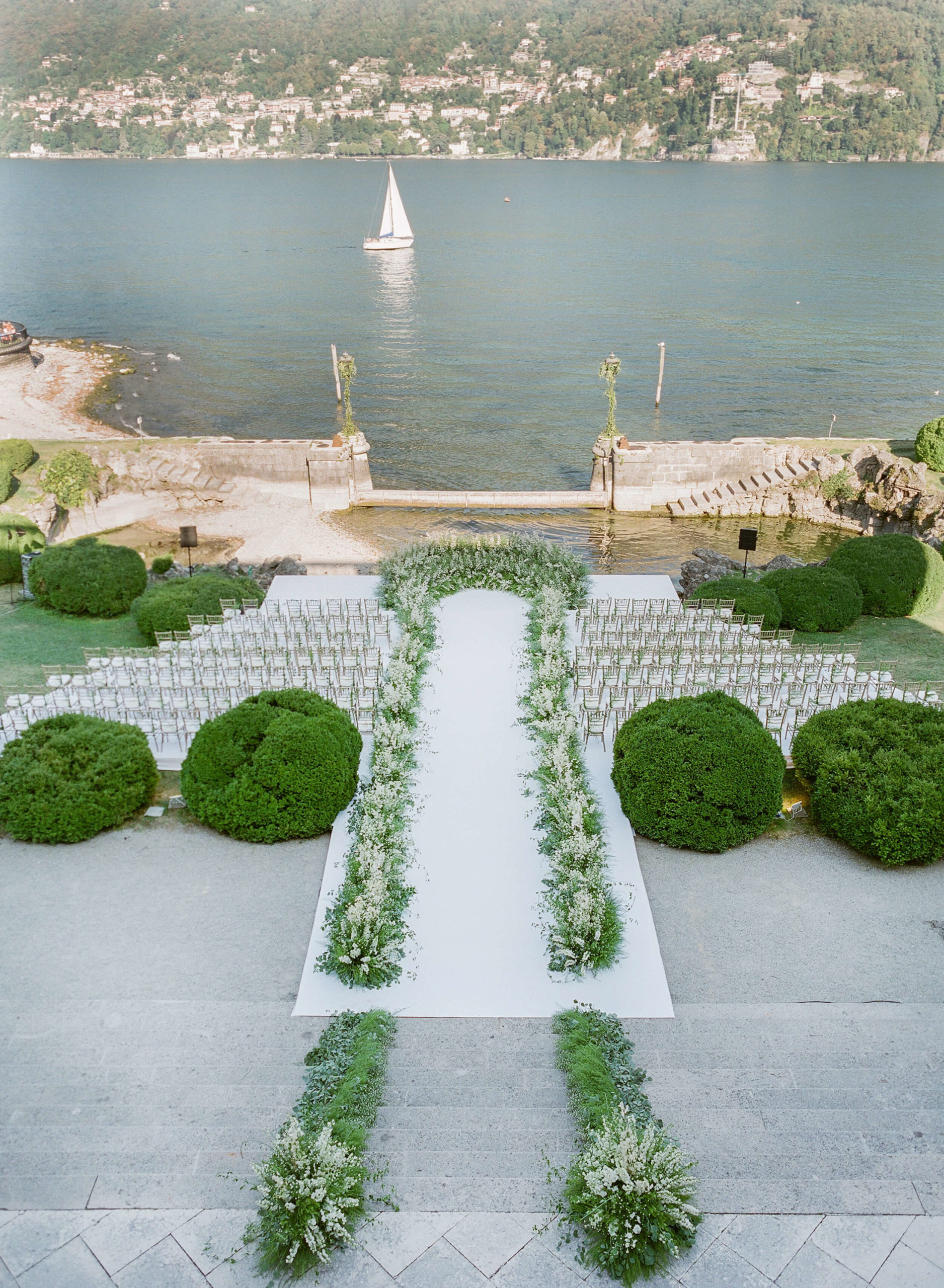 Destination wedding ceremony setup in Lake Como, Italy