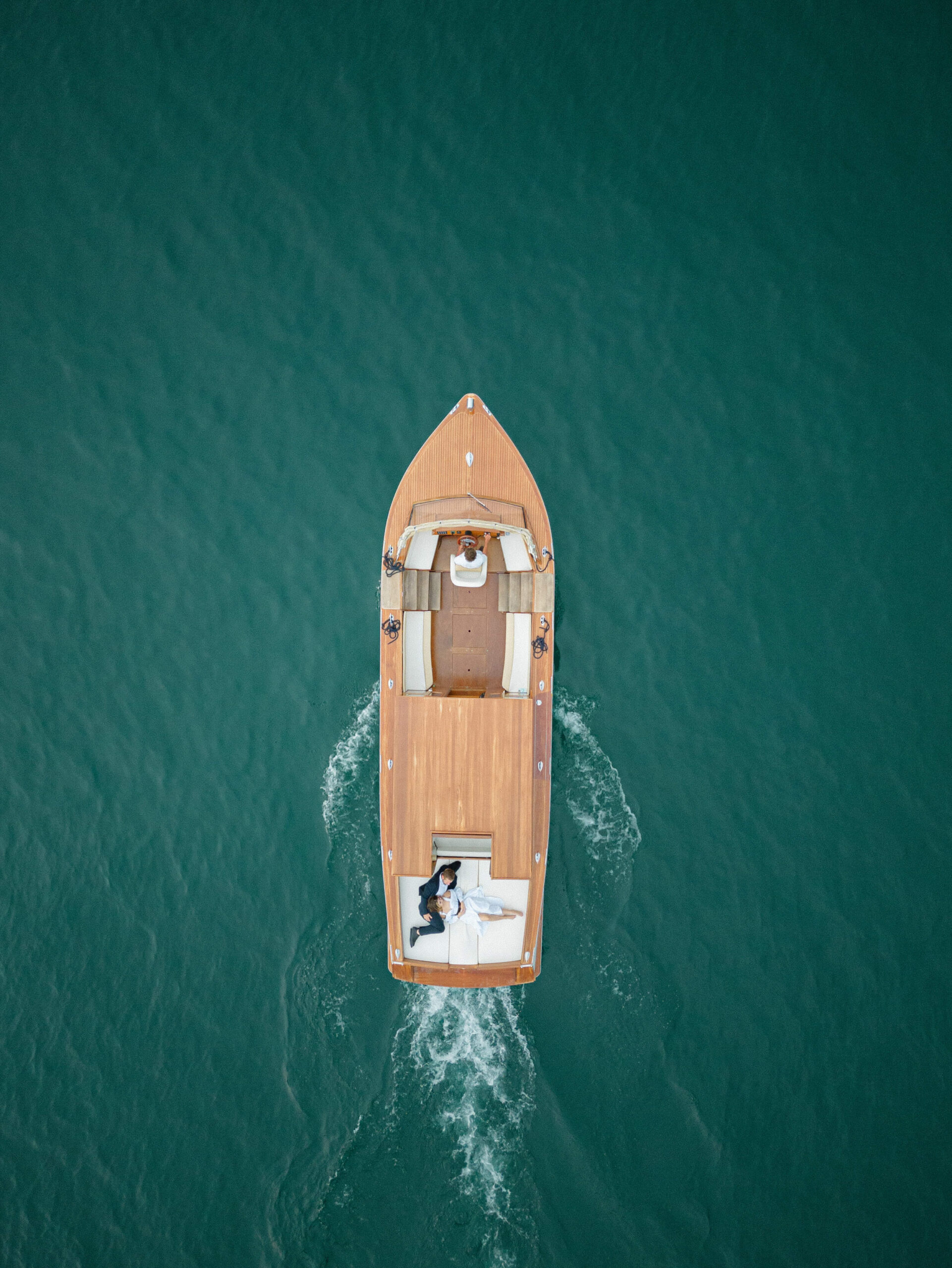 Aerial shot of boat on Lake Como