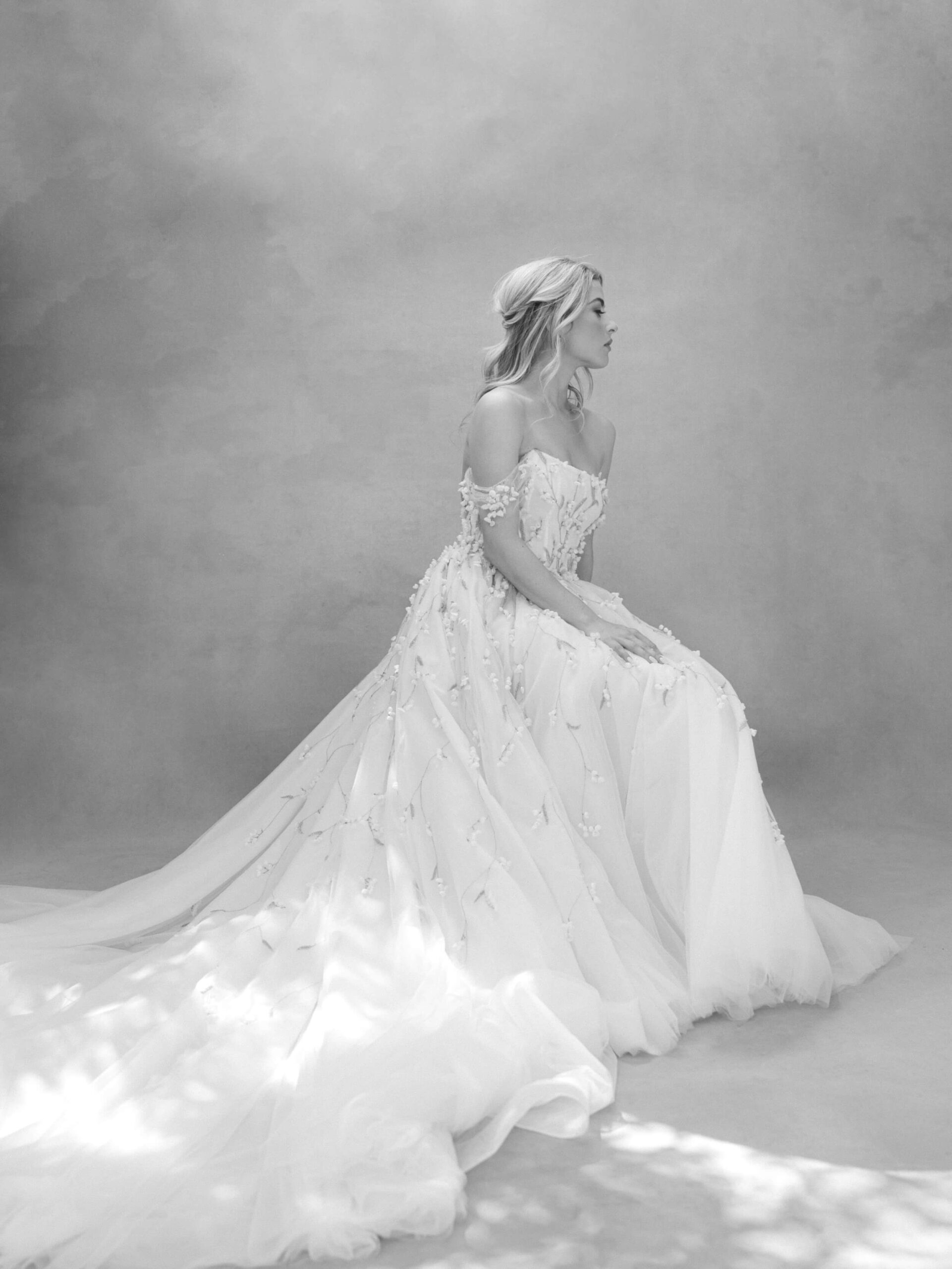 Bride wearing Monique Lhuillier’s Lily of the Valley wedding gown