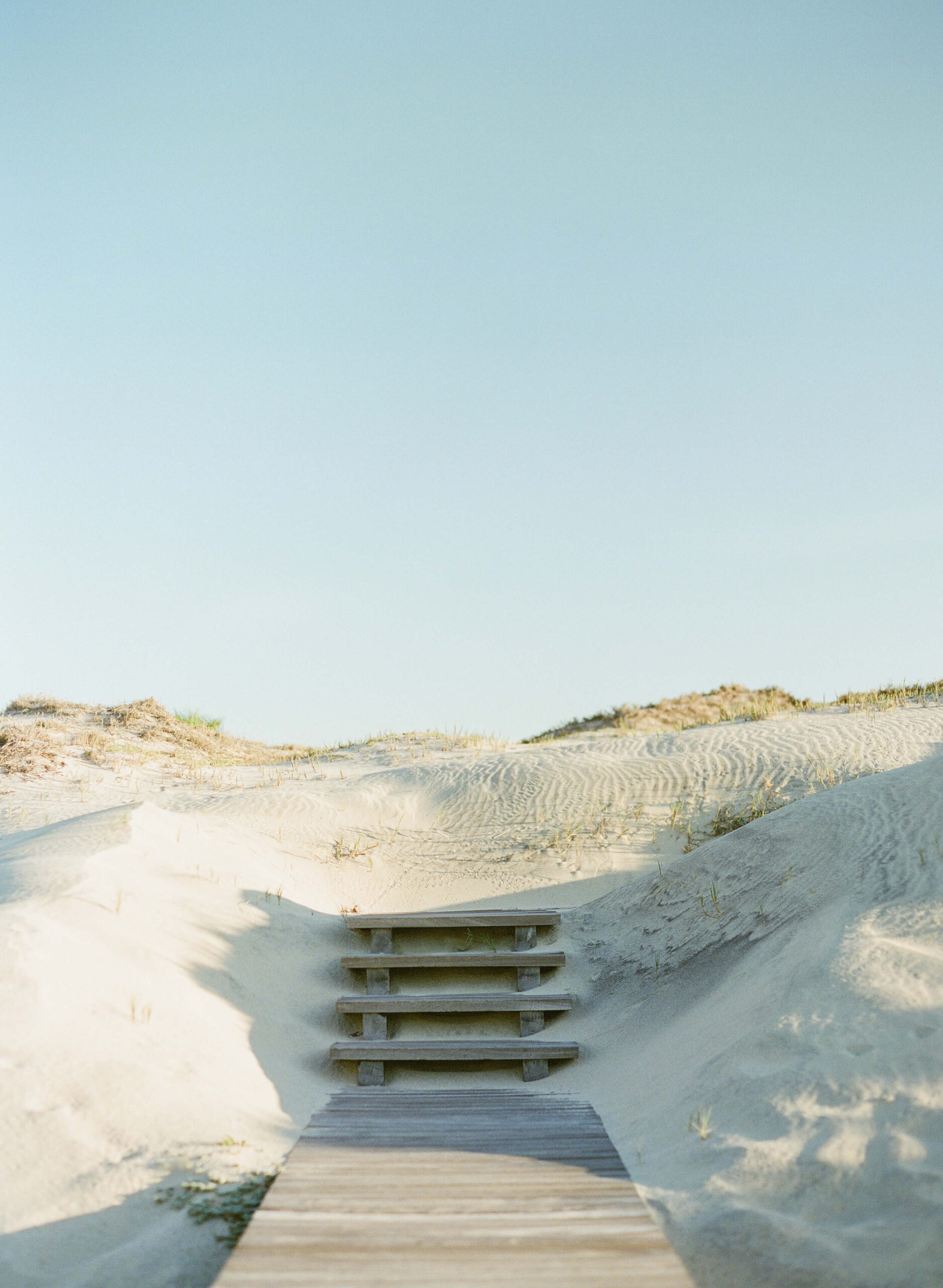 Wooden stairs in sand dunes