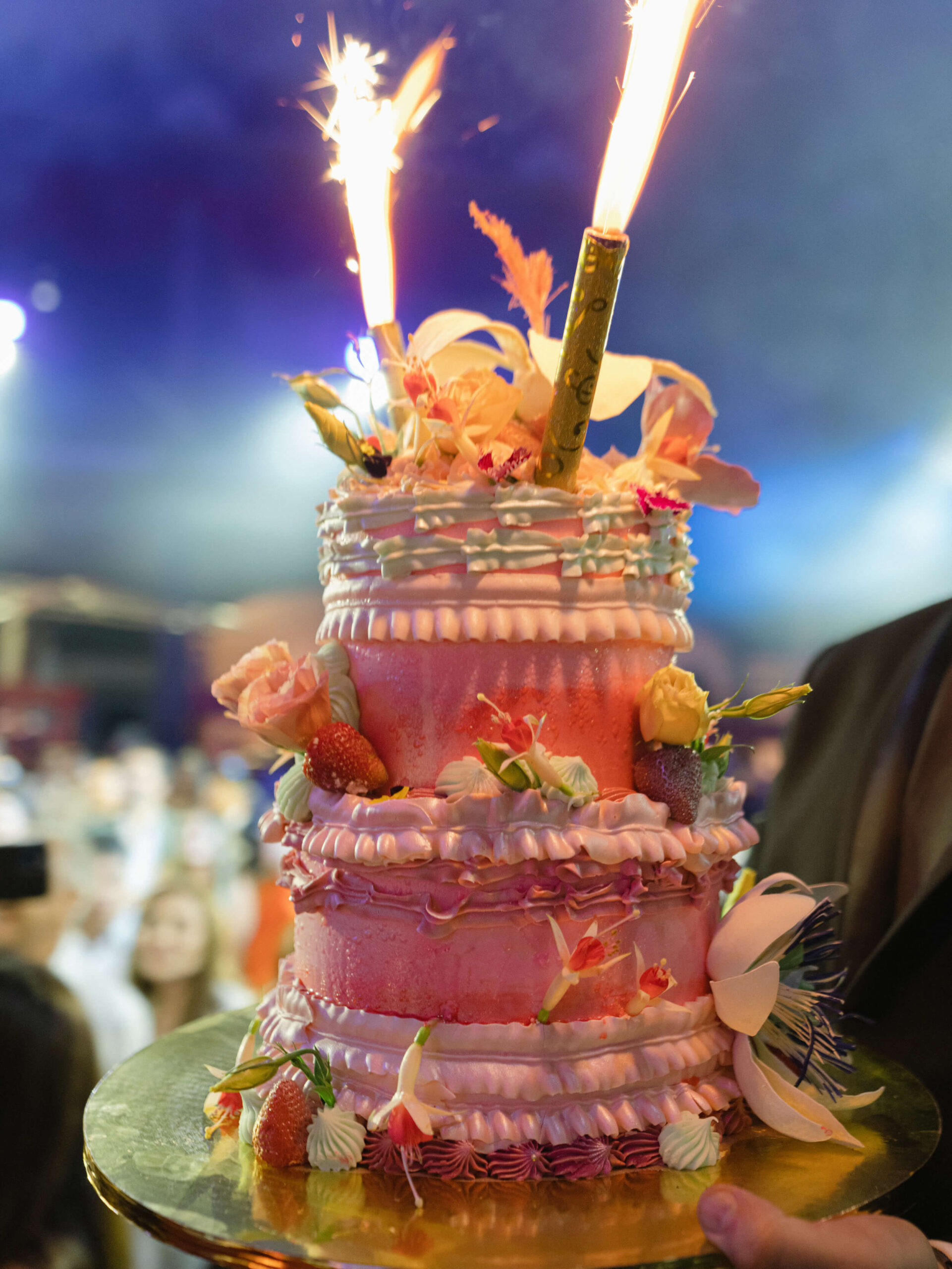 A decorative cake with sparklers