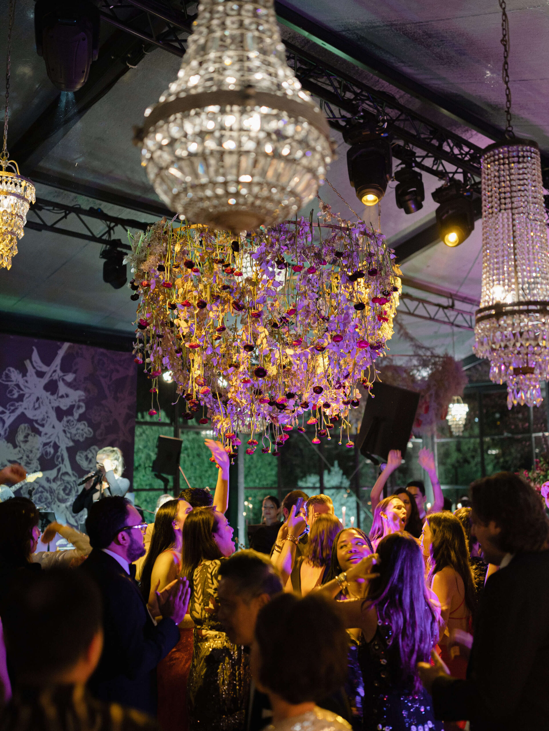 grand chandelier illuminates the party