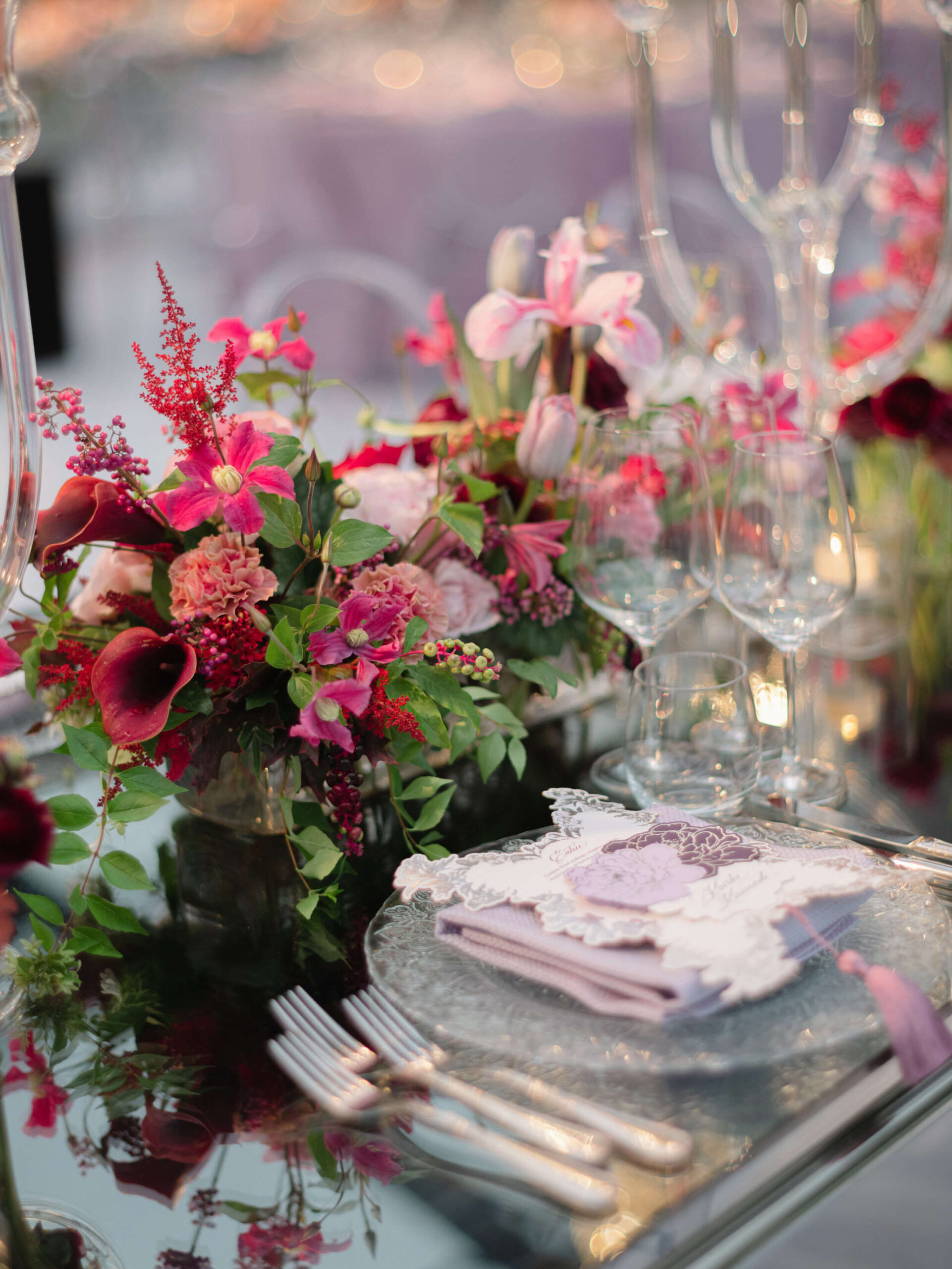 elegant table setting with pink and purple florals